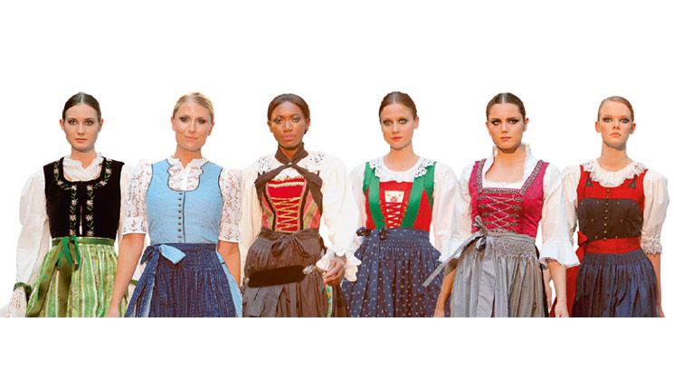 Verschiedene Dirndl-Modelle die die Vielseitigkeit der traditionellen Kleidung darstellen.